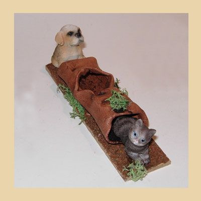 Clay Trunk with Cat and Dog