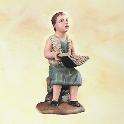 Niño Sentado Piedra con Libro