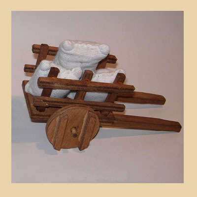 Carro Madera con 3 Sacos.