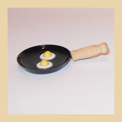 Sartén de Hierro con Mango Madera y Dos Huevos Fritos