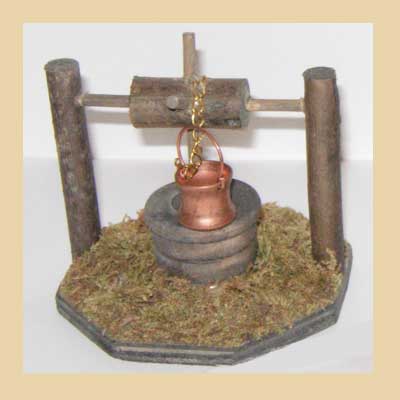 Pozo Madera con cubo de Cobre